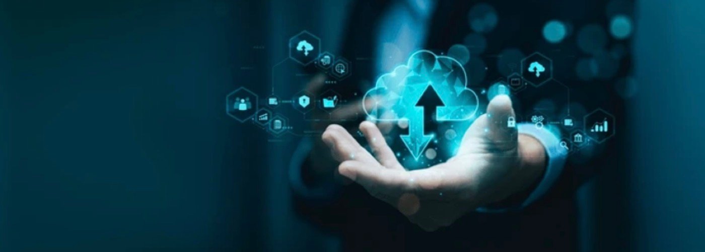 A hand presenting a holographic network and cloud connectivity graphic.